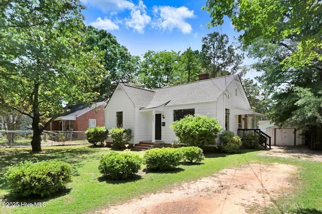 403 S Andrews Ave, Goldsboro, NC 27530 - view of front of property featuring a chimney and a shingled roof