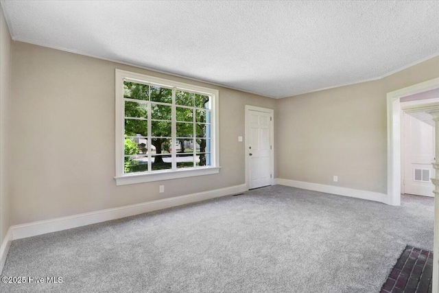 403 S Andrews Ave, Goldsboro, NC 27530 - carpeted spare room with a textured ceiling and baseboards