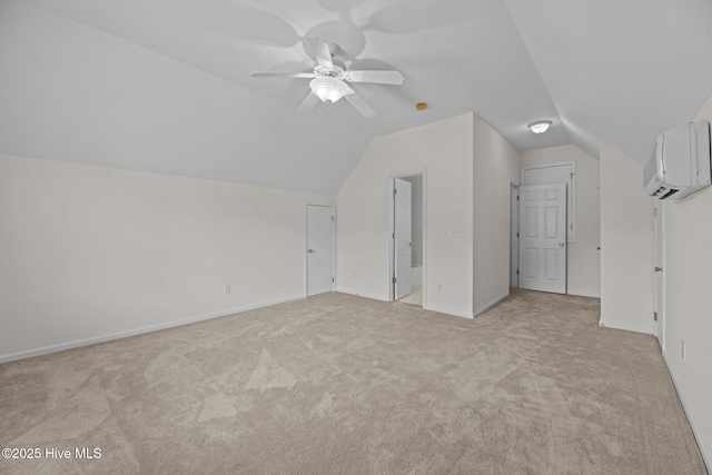 309 Belle Oaks Dr, New Bern, NC 28562 - additional living space with light colored carpet, vaulted ceiling, an AC wall unit, ceiling fan, and baseboards