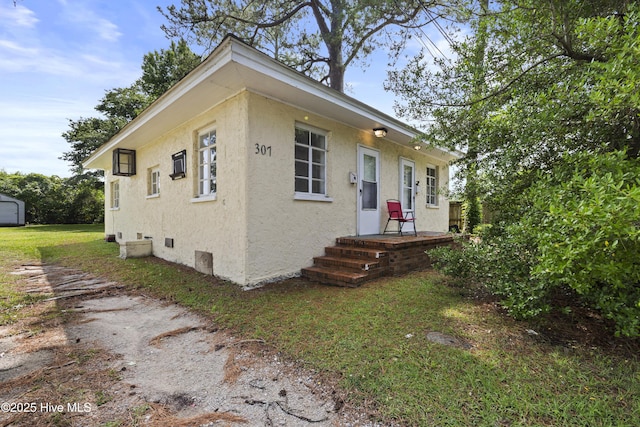 307 Preston Rd Unit A & B, Jacksonville, NC 28540 - view of front of house with stucco siding and a front lawn