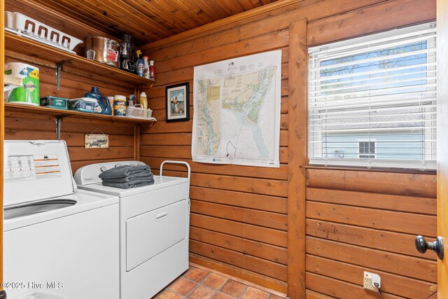 103 NE 17th St, Oak Island, NC 28465 - washroom with wooden walls, wood ceiling, independent washer and dryer, and light tile patterned floors