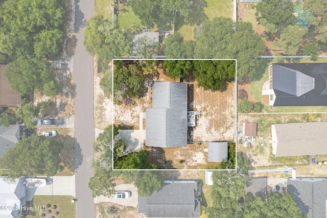 103 NE 17th St, Oak Island, NC 28465 - aerial perspective of suburban area with property parcel outlined