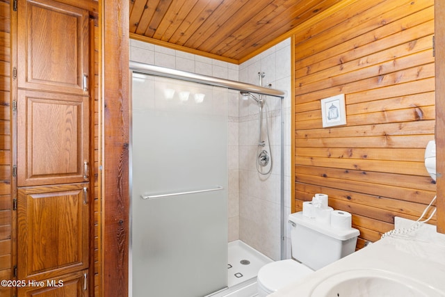 103 NE 17th St, Oak Island, NC 28465 - bathroom featuring toilet, a shower stall, wooden walls, wood ceiling, and vanity