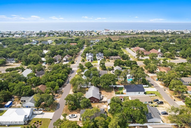 103 NE 17th St, Oak Island, NC 28465 - aerial perspective of suburban area featuring a nearby body of water
