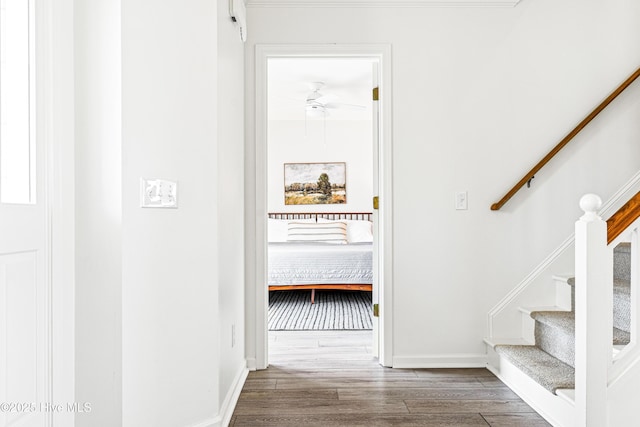 271 E Second St, Ocean Isle Beach, NC 28469 - hall with wood finished floors, stairs, and baseboards
