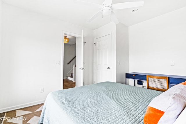 271 E Second St, Ocean Isle Beach, NC 28469 - bedroom featuring baseboards and a ceiling fan