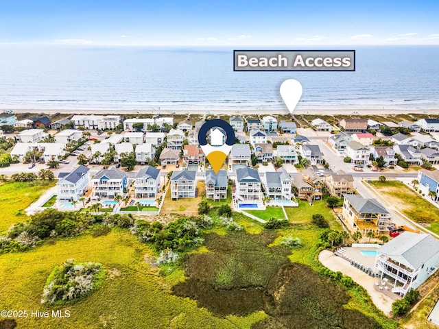 271 E Second St, Ocean Isle Beach, NC 28469 - aerial perspective of suburban area with expansive coastline