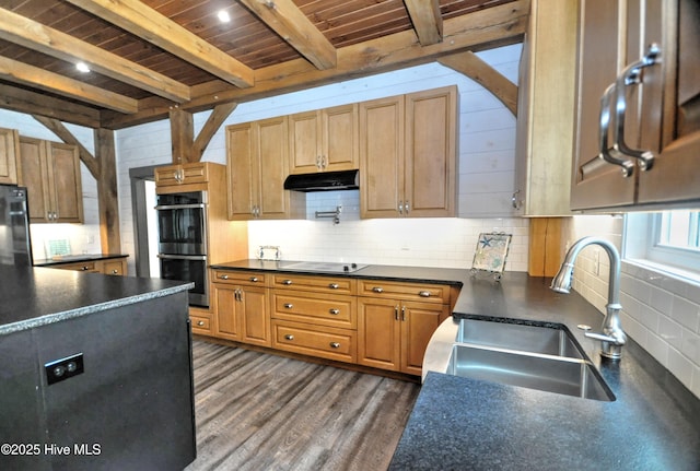 9265 W Lake Rd, Calabash, NC 28467 - kitchen featuring a sink, black appliances, under cabinet range hood, dark countertops, and wood ceiling with exposed beams
