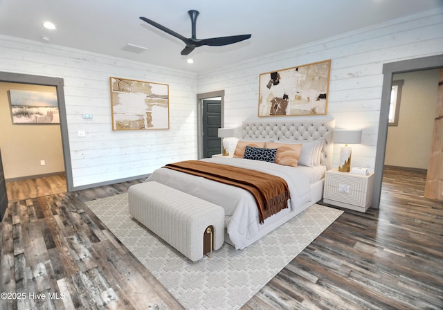 9265 W Lake Rd, Calabash, NC 28467 - bedroom with wood finished floors, baseboards, wood walls, recessed lighting, and a ceiling fan