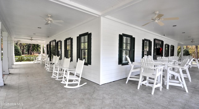 9265 W Lake Rd, Calabash, NC 28467 - view of patio / terrace with ceiling fan and outdoor dining area