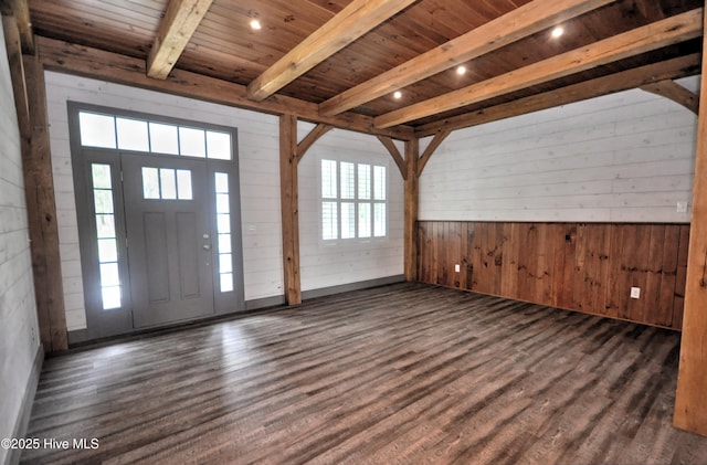 9265 W Lake Rd, Calabash, NC 28467 - foyer entrance with wooden walls, plenty of natural light, dark wood finished floors, and wooden ceiling with exposed beams
