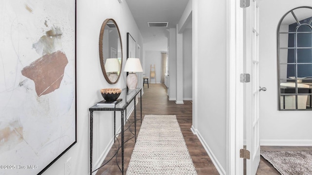 2031 Minnette Cir, New Bern, NC 28562 - hall with dark wood-style flooring and baseboards