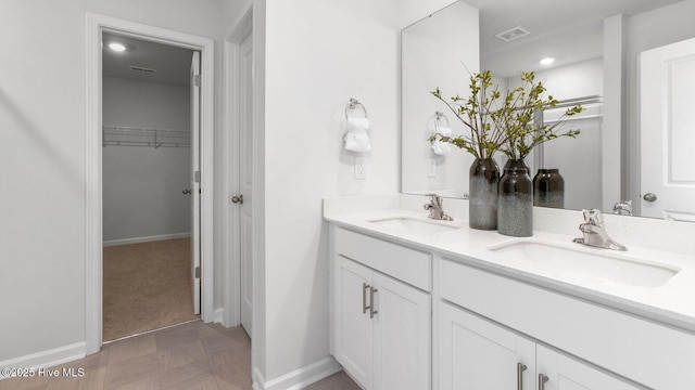 2031 Minnette Cir, New Bern, NC 28562 - full bath featuring double vanity, baseboards, and a spacious closet