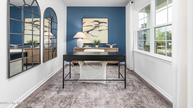 2031 Minnette Cir, New Bern, NC 28562 - office space featuring wood finished floors, healthy amount of natural light, and an accent wall