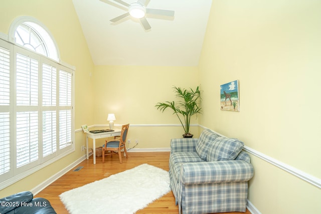 3399 Channelside Dr SW, Supply, NC 28462 - sitting room with wood finished floors, lofted ceiling, a ceiling fan, and baseboards