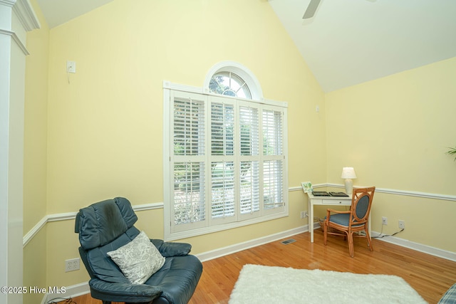 3399 Channelside Dr SW, Supply, NC 28462 - sitting room featuring wood finished floors, high vaulted ceiling, baseboards, and ceiling fan