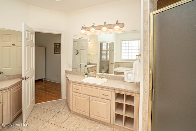 3399 Channelside Dr SW, Supply, NC 28462 - bathroom featuring vanity, tile patterned flooring, toilet, and a shower stall