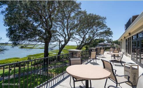 3399 Channelside Dr SW, Supply, NC 28462 - view of patio with a balcony and a water view