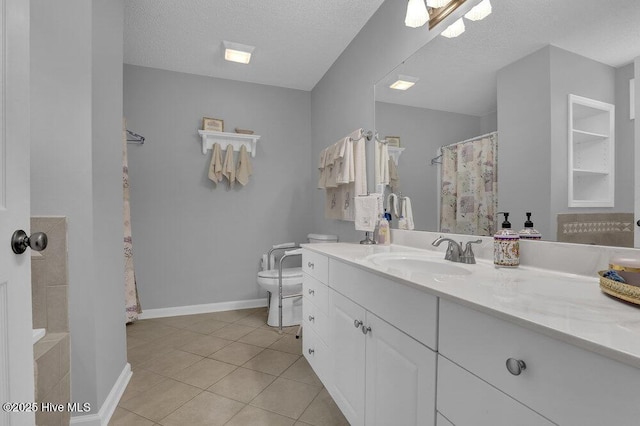111 Bay Tree Cir, Hampstead, NC 28443 - bathroom featuring vanity, tile patterned flooring, toilet, a textured ceiling, and a shower with curtain