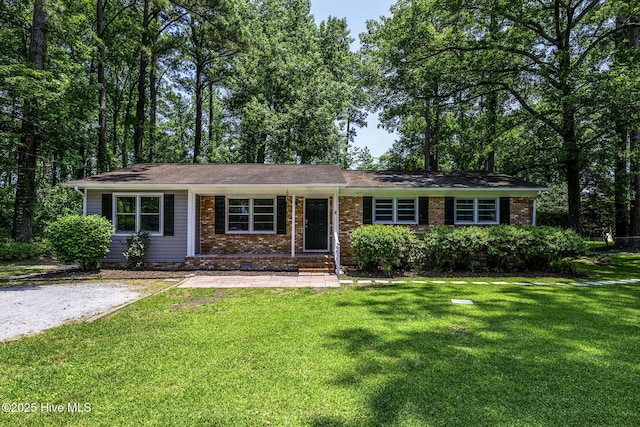 429 Swiss Rd, New Bern, NC 28560 - single story home featuring a front yard, brick siding, and crawl space