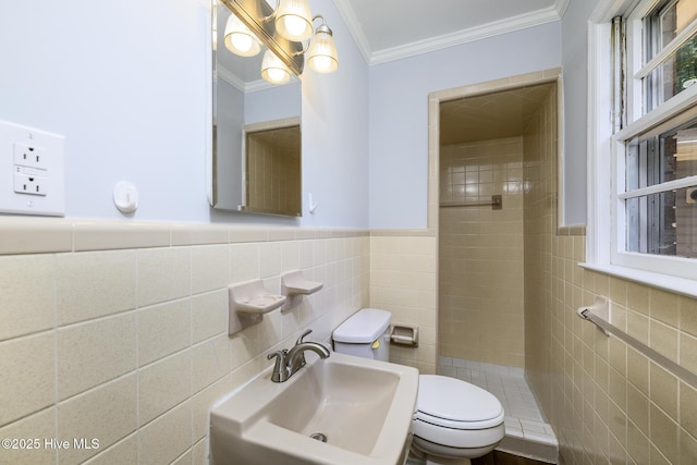 429 Swiss Rd, New Bern, NC 28560 - full bathroom featuring tile walls, a tile shower, toilet, a sink, and ornamental molding