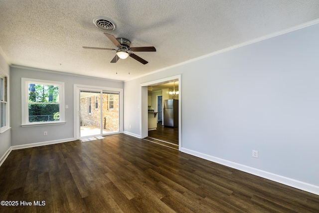 429 Swiss Rd, New Bern, NC 28560 - spare room featuring ceiling fan, ornamental molding, dark wood-type flooring, baseboards, and a textured ceiling