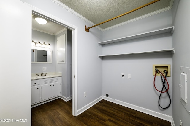 429 Swiss Rd, New Bern, NC 28560 - laundry area featuring hookup for a washing machine, hookup for an electric dryer, dark wood finished floors, a textured ceiling, and ornamental molding
