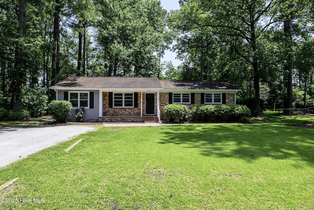 429 Swiss Rd, New Bern, NC 28560 - ranch-style home with a front yard and brick siding