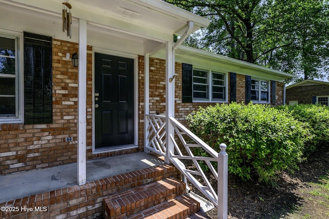 429 Swiss Rd, New Bern, NC 28560 - doorway to property with brick siding