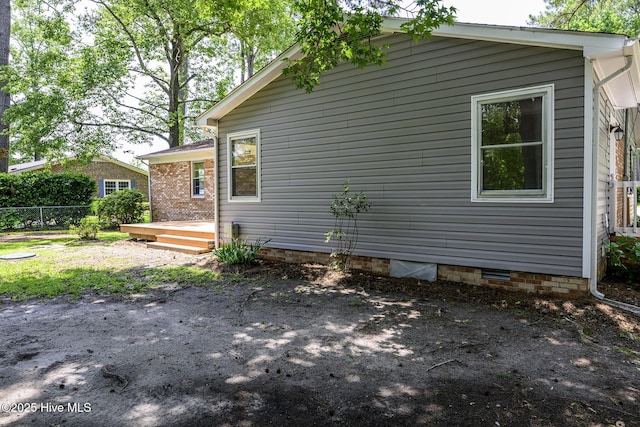 429 Swiss Rd, New Bern, NC 28560 - view of side of property with crawl space and a wooden deck