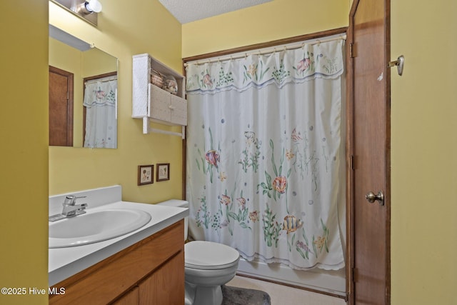 241 Moonlight Dr, Atlantic Beach, NC 28512 - full bathroom with vanity, toilet, shower / tub combo, and a textured ceiling