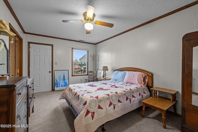 241 Moonlight Dr, Atlantic Beach, NC 28512 - bedroom featuring light colored carpet, crown molding, a textured ceiling, and ceiling fan