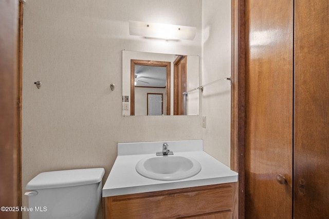241 Moonlight Dr, Atlantic Beach, NC 28512 - half bathroom featuring vanity and toilet