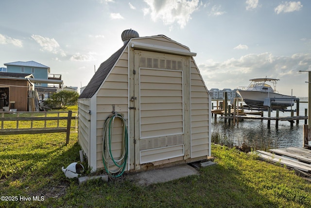 241 Moonlight Dr, Atlantic Beach, NC 28512 - view of shed featuring boat lift and a water view