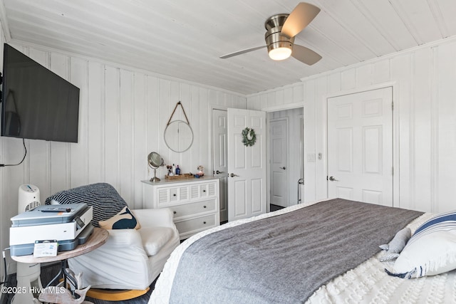 1001 W Beach Dr, Oak Island, NC 28465 - bedroom with ceiling fan