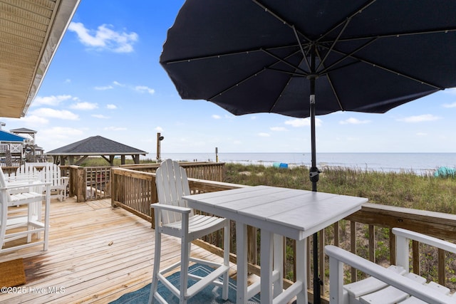 1001 W Beach Dr, Oak Island, NC 28465 - deck with a water view