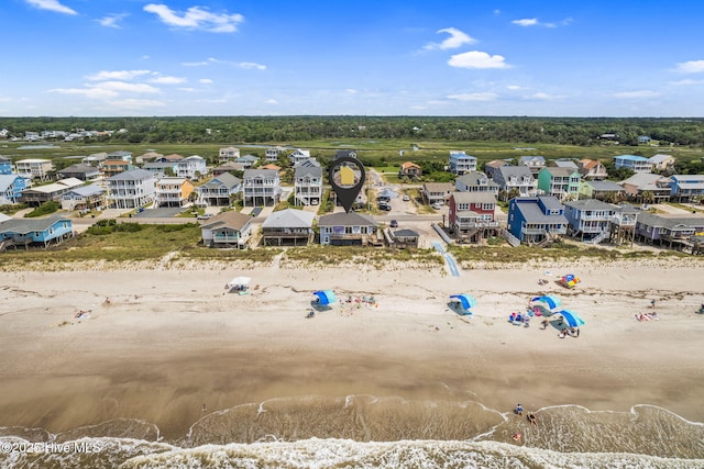 1001 W Beach Dr, Oak Island, NC 28465 - aerial perspective of suburban area featuring expansive coastline