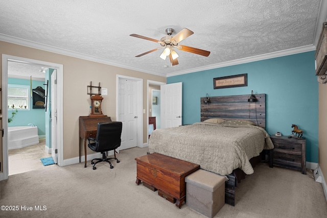 710 Ridgecrest Ln, Rocky Point, NC 28457 - bedroom featuring carpet flooring, a textured ceiling, ornamental molding, baseboards, and ceiling fan