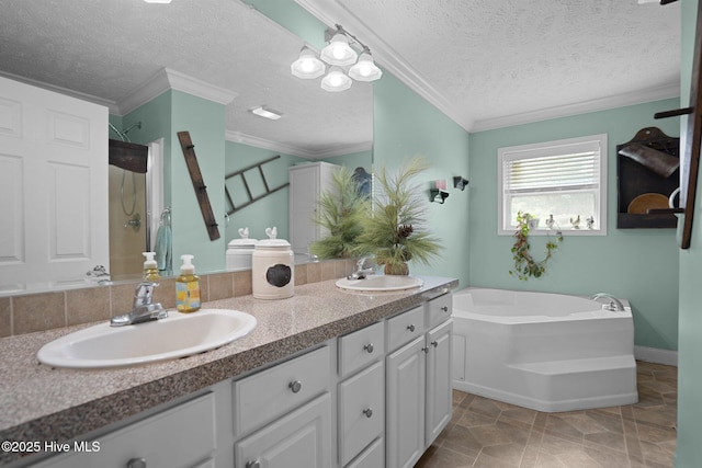 710 Ridgecrest Ln, Rocky Point, NC 28457 - bathroom featuring a bath, double vanity, a textured ceiling, ornamental molding, and a shower