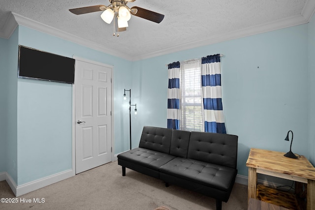 710 Ridgecrest Ln, Rocky Point, NC 28457 - living area with a textured ceiling, crown molding, ceiling fan, carpet flooring, and baseboards