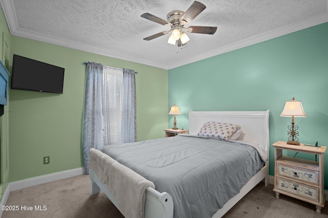 710 Ridgecrest Ln, Rocky Point, NC 28457 - carpeted bedroom with ornamental molding, a textured ceiling, baseboards, and ceiling fan