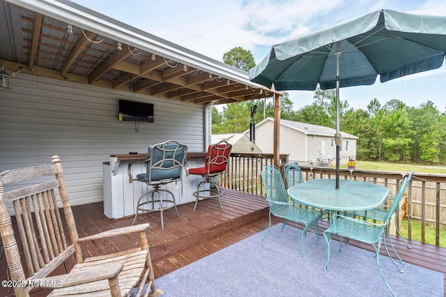710 Ridgecrest Ln, Rocky Point, NC 28457 - wooden terrace with outdoor dining space