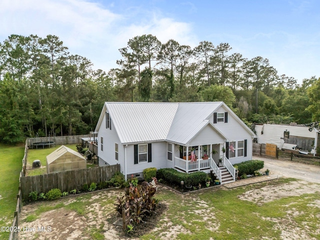 710 Ridgecrest Ln, Rocky Point, NC 28457 - view of front of property with a porch and metal roof
