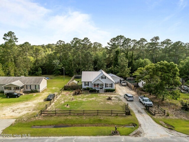 710 Ridgecrest Ln, Rocky Point, NC 28457 - view from above of property featuring a heavily wooded area