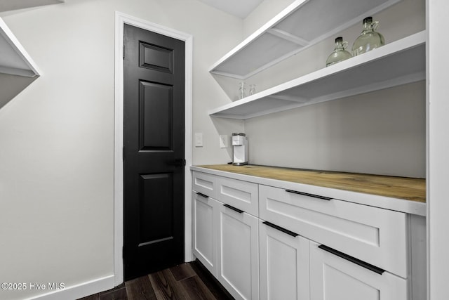648 Cobblestone Dr, Wilmington, NC 28405 - bar area with dark wood-style floors