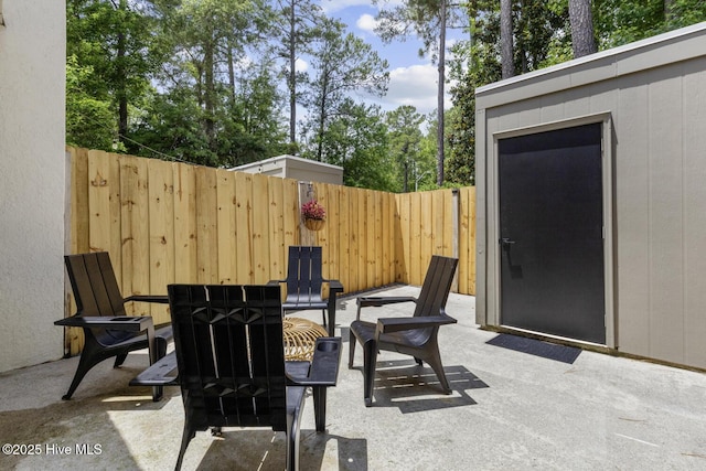 648 Cobblestone Dr, Wilmington, NC 28405 - fenced backyard featuring a patio