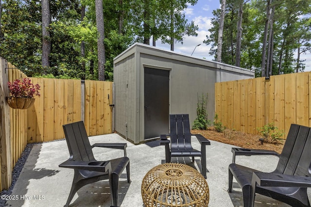 648 Cobblestone Dr, Wilmington, NC 28405 - fenced backyard featuring a patio area and an outbuilding