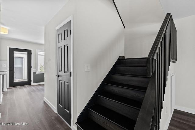 648 Cobblestone Dr, Wilmington, NC 28405 - stairs with wood finished floors and baseboards