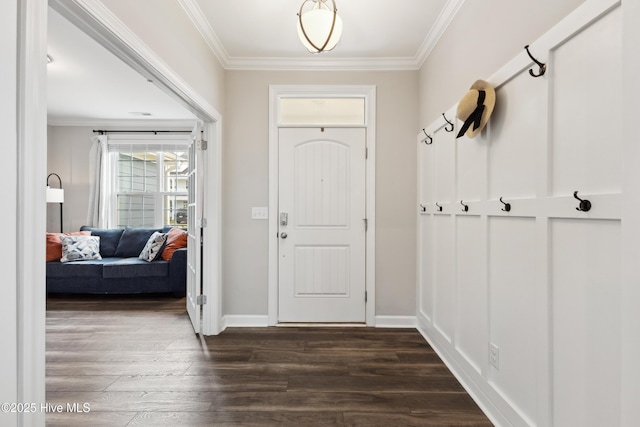 438 Sugar Cove Run, Wilmington, NC 28411 - foyer entrance with ornamental molding, dark wood-style flooring, and baseboards