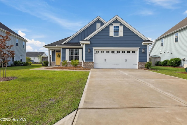 438 Sugar Cove Run, Wilmington, NC 28411 - view of front facade featuring board and batten siding, a front lawn, concrete driveway, and an attached garage